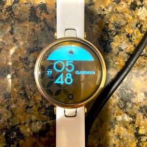 Garmin Lily watch with charging cable